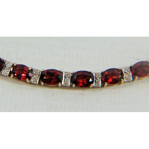 401 - 14ct Yellow Gold Diamond and Garnet set Bracelet  13.1g