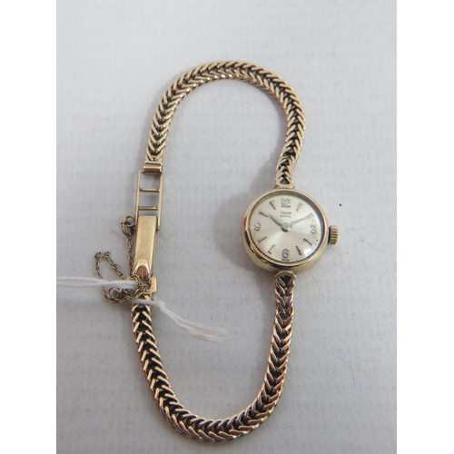 403 - Rolex Tudor ladies watch with 9ct Yellow Gold case and strap.  Intermittent runner. 11.1g