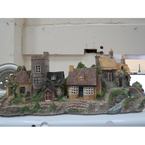 758 - Illuminated model of a village. Working order. See photos