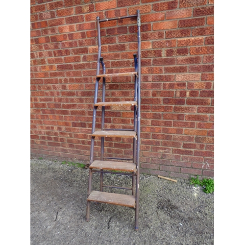 989 - Pair of vintage metal and wood step ladders.