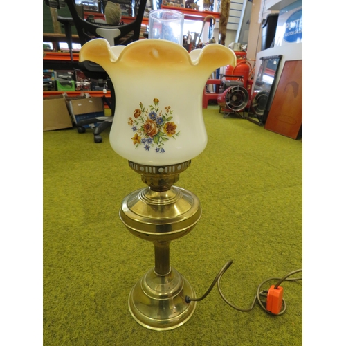 994 - Vintage oil lamp converted to electric with a floral glass shade.