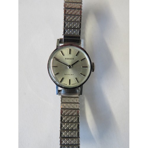 406A - Ladies Tissot stylist watch in running order. See photos