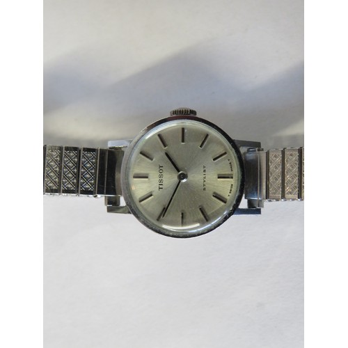 406A - Ladies Tissot stylist watch in running order. See photos