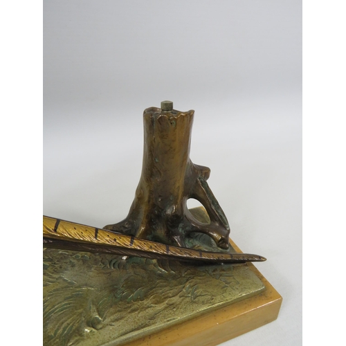 25 - Austrian cold painted spelter Pheasant match striker on a wooden base. It measures 21cm tall and 31.... 