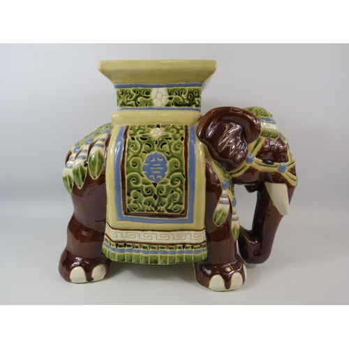 49 - Large majolica style elephant plant stand, approx 41cm tall and 48cm long.