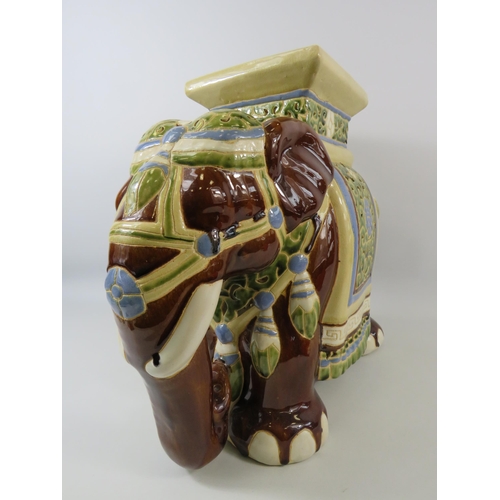 49 - Large majolica style elephant plant stand, approx 41cm tall and 48cm long.