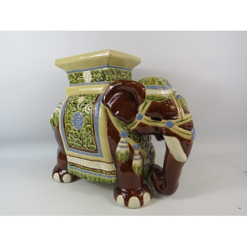 49 - Large majolica style elephant plant stand, approx 41cm tall and 48cm long.