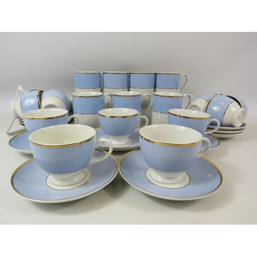 64 - Royal Doulton Blue, white and gold coffee cups, teacups and saucers. More Dishes added after photo.