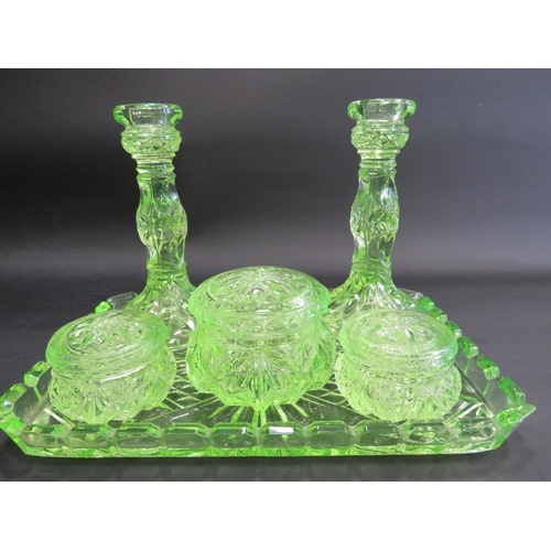 86 - Art deco uranuim glass dressing table set.