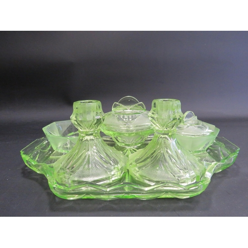 87 - Art deco uranuim glass dressing table set.