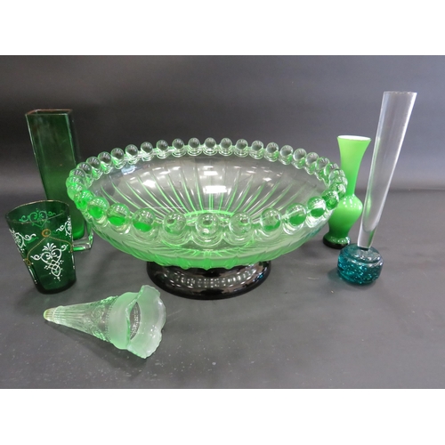 98 - Very large art deco uranuim glass bowl with a black glass base, approx 11