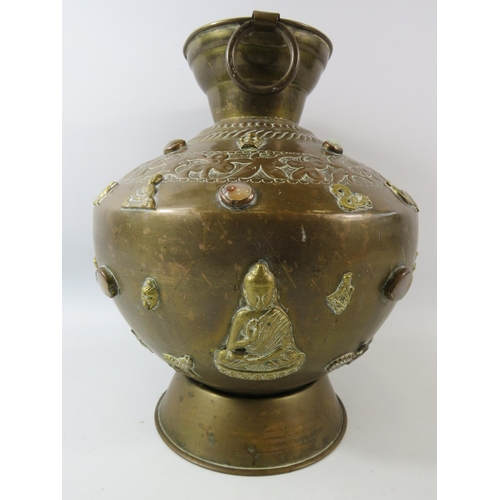 138 - Large Asian brass Buddha temple jar highly decorated with semi precious stone cabochons and Buddist ... 