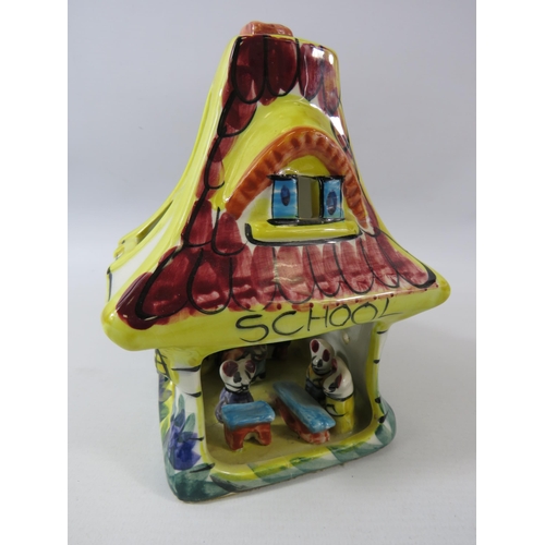 144 - Derek Fowler pottery school house. 18cm tall, 16cm long.