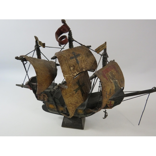 152 - Vintage wooden model ship of the Santa Maria. Approx 29cm tall and 43cm long.