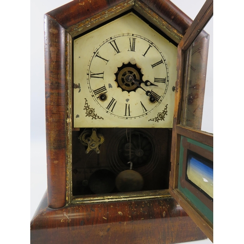 163 - Antique Gilberts Cottage mantle clock in working condtion. Approx 39cm tall.