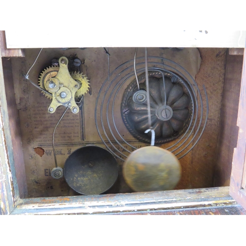 163 - Antique Gilberts Cottage mantle clock in working condtion. Approx 39cm tall.