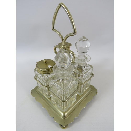 171 - Silverplated and glass vintage cruet set. Approx 23cm tall.