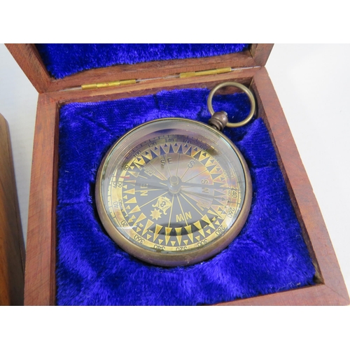 178 - Reproduction Nautical compass and a pocket compass both with wooden storage boxes.