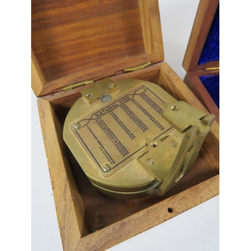 178 - Reproduction Nautical compass and a pocket compass both with wooden storage boxes.