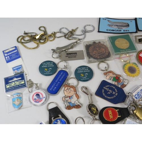 179 - Selection advertising keyrings and walking stick badges.