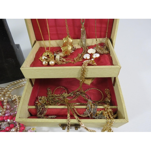 506 - 2 jewellery boxes and costume jewellery contents includes some sterling silver.