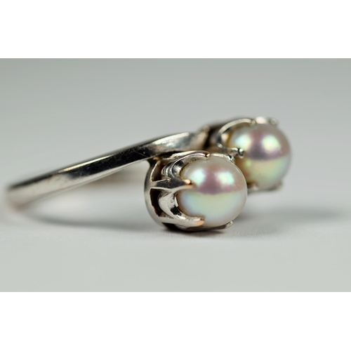 414 - 18ct White Gold Twin Pearl set ring.   Finger size N-5  5.1g