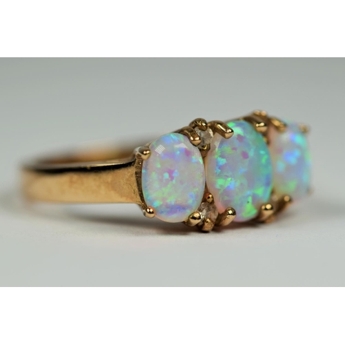 416 - 9ct Yellow Gold Trilogy set Opal ring interspersed with Melee Diamonds. Finger size  O-5   3.6g