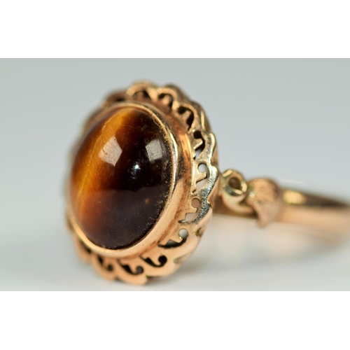 428 - 14ct Yellow Gold ring set with Tiger's Eye   Finger size N-5   3.8g