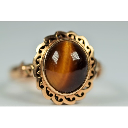 428 - 14ct Yellow Gold ring set with Tiger's Eye   Finger size N-5   3.8g