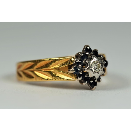 434 - 18ct Yellow Gold ring set with a Central Diamond and Sapphire surround. Finger size Q   4.9g