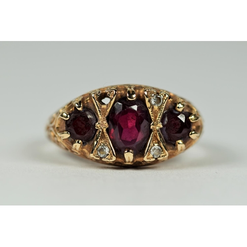 438 - 9ct Yellow Gold Garnet and Gemstone set Gypsy Style Ring (one tiny gemstone missing)   Finger size N... 