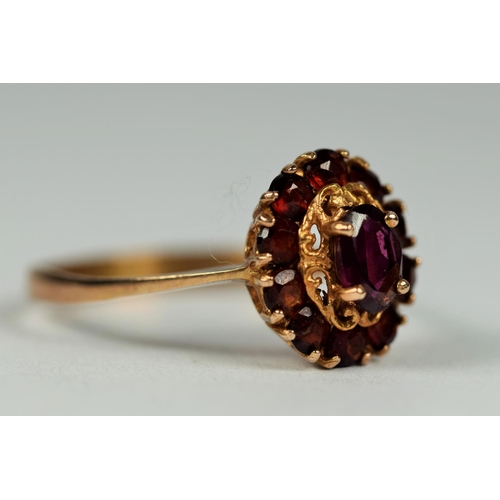 439 - 9ct Yellow Gold Garnet set Cluster ring.  Finger size P-5    2.3g