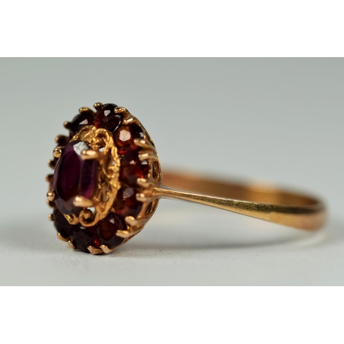 439 - 9ct Yellow Gold Garnet set Cluster ring.  Finger size P-5    2.3g