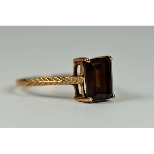 440 - 9ct Gold ring set with Smokey Quartz  Finger size K-5   1.3g