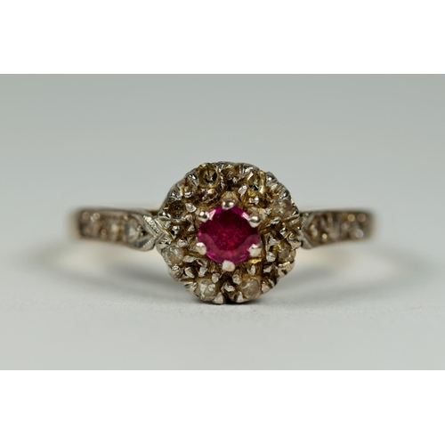 441 - 18ct yellow Gold Ruby ring with Diamond Halo and shoulders on Platinum Mount.  Finger size Q    3.2g