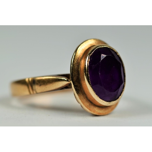 443 - 14ct Yellow Gold ring set with an Oval Amethyst.  Finger size L   4.1