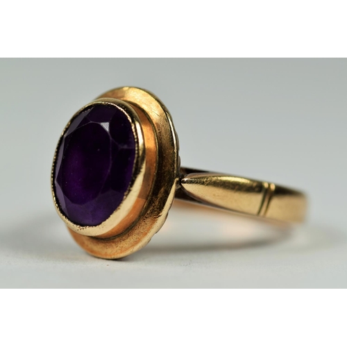 443 - 14ct Yellow Gold ring set with an Oval Amethyst.  Finger size L   4.1