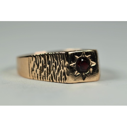 450 - 9ct Yellow Gold Gents, Chunky Garnet set Signet ring.  Finger size Y-5    5.3g