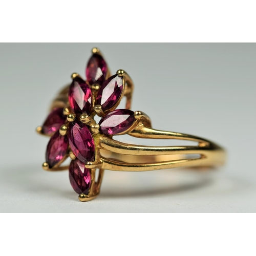 460 - 9ct Yellow Gold Multi Amethyst set ring in a flower pattern.  Finger size R-5  3.0g