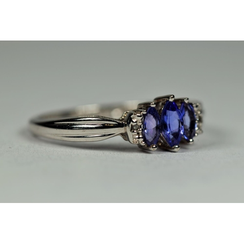 465 - 9ct White Gold Tanzanite Trilogy Ring set with Diamond Shoulders.    Finger size R    2.0g