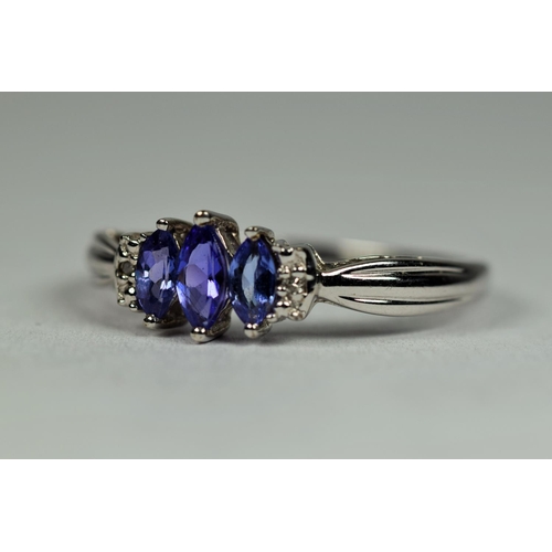 465 - 9ct White Gold Tanzanite Trilogy Ring set with Diamond Shoulders.    Finger size R    2.0g