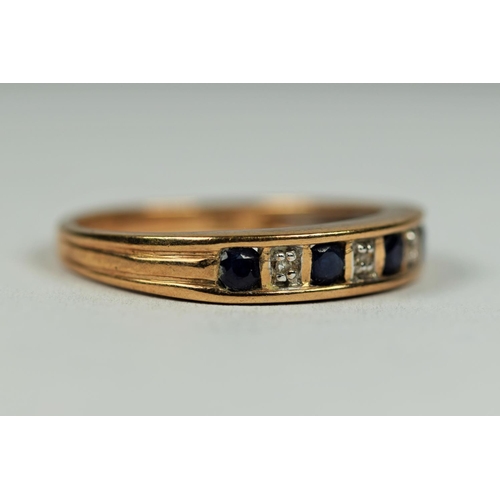 471 - 9ct Yellow Gold Diamond and Sapphire quarter eternity ring. Finger size     2.4g