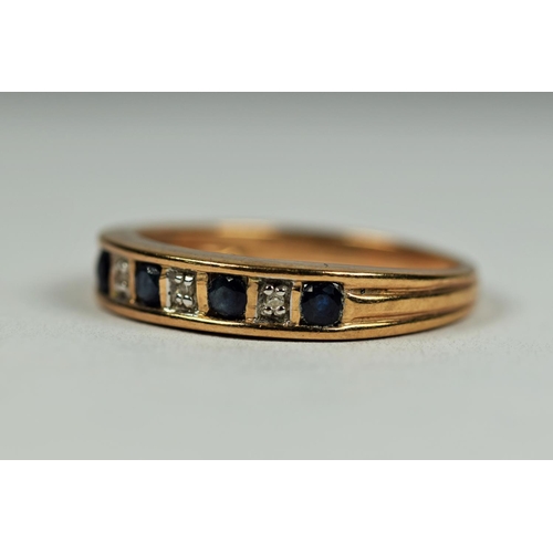 471 - 9ct Yellow Gold Diamond and Sapphire quarter eternity ring. Finger size     2.4g