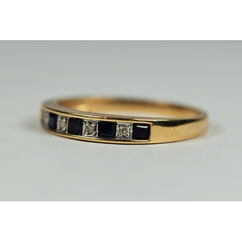 477 - 9ct Yellow Gold Diamond and Sapphire quarter eternity ring. Finger size     1.8g