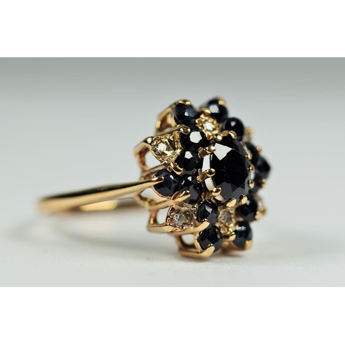 485 - 9ct Yellow Gold Diamond and Sapphire set Statement ring.   Finger size 'T'    4.1g   Hallmarked for ... 