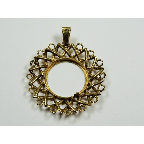 498 - 9ct Full Sovereign Pendant mount which weighs 8.8g