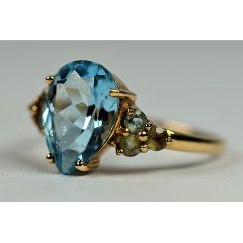 482 - 9ct Yellow Gold Aqua set ring with white Topaz to shoulders.  Finger size P-5    2.8g