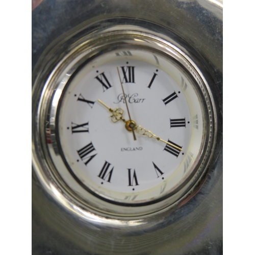 552 - R Carr Small Sterling silver clock hallmark for Sheffield. It measures 9cm by 6.5cm