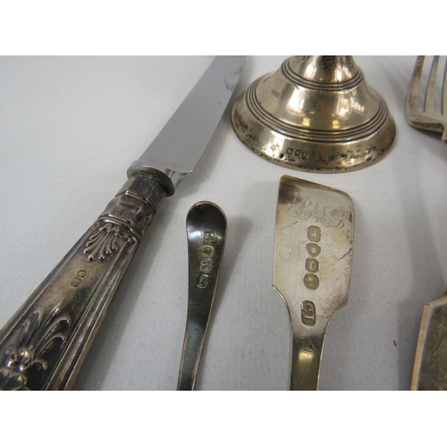 562 - Selection of sterling silver including spoons, forks, Candlestick etc. (weight of 2 forks and 2 spoo... 