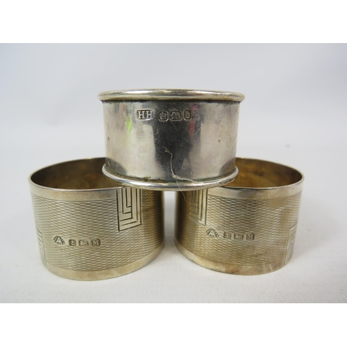 567 - 3 Sterling silver napkin rings, Sheffield and birmingham hallmarks. Total weight 94.9 grams